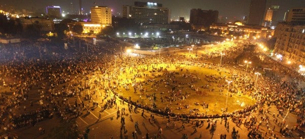 People gather in Tahrir square to celebrate the anniversary of an attack on Israeli forces during the 1973 war, in Cairo